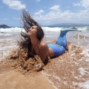 mermaid in Maui with ocean splash