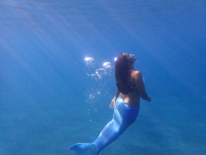 blue mermaid underwater bubbles