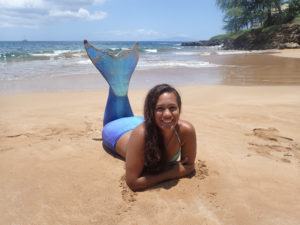 Mermaid enjoying a break on the beach in Maui